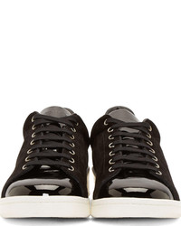 Baskets basses en daim noires Alexander McQueen