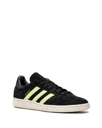 Baskets basses en daim noires adidas