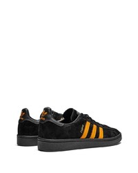 Baskets basses en daim noires adidas