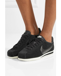 Baskets basses en daim noires Nike