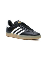 Baskets basses en daim noires adidas