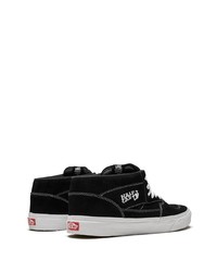 Baskets basses en daim noires Vans