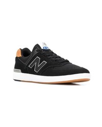 Baskets basses en daim noires New Balance