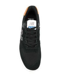 Baskets basses en daim noires New Balance