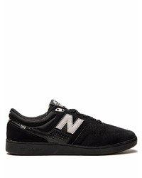 Baskets basses en daim noires New Balance