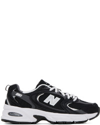 Baskets basses en daim noires New Balance