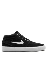 Baskets basses en daim noires Nike