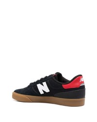 Baskets basses en daim noires New Balance