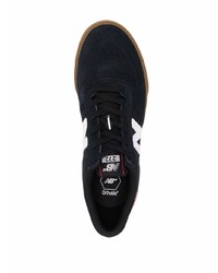 Baskets basses en daim noires New Balance