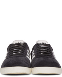 Baskets basses en daim noires adidas