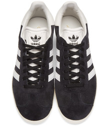 Baskets basses en daim noires adidas