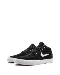 Baskets basses en daim noires Nike