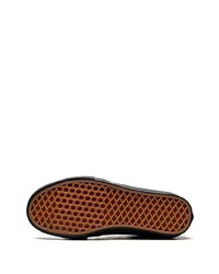 Baskets basses en daim noires Vans