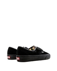 Baskets basses en daim noires Vans