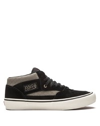 Baskets basses en daim noires Vans