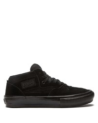 Baskets basses en daim noires Vans