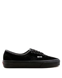 Baskets basses en daim noires Vans