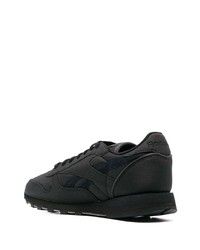 Baskets basses en daim noires Reebok