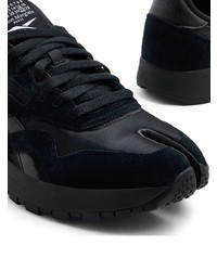 Baskets basses en daim noires Reebok