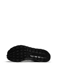 Baskets basses en daim noires Nike