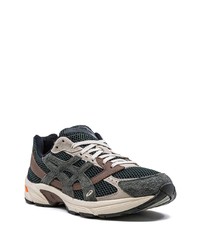 Baskets basses en daim olive Asics