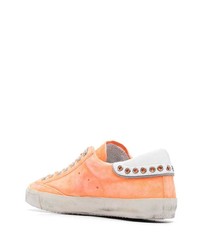 Baskets basses en daim orange Philippe Model Paris