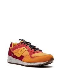 Baskets basses en daim orange Saucony