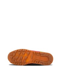 Baskets basses en daim orange Saucony