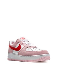 Baskets basses en daim roses Nike