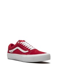 Baskets basses en daim rouge et blanc Vans