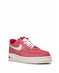 Baskets basses en daim rouges Nike