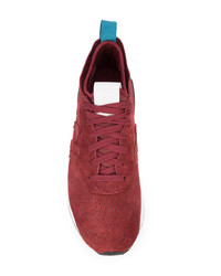 Baskets basses en daim rouges New Balance