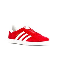 Baskets basses en daim rouges adidas