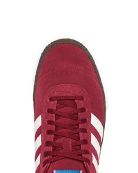 Baskets basses en daim rouges adidas