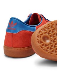 Baskets basses en daim rouges adidas