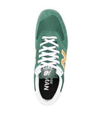 Baskets basses en daim vert foncé Junya Watanabe