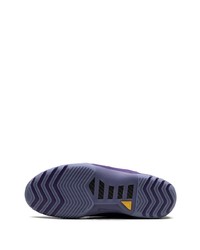 Baskets basses en daim violettes Nike