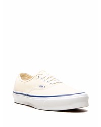 Baskets basses en toile beiges Vans