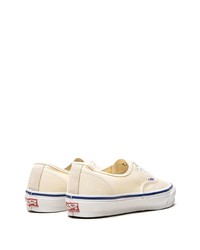 Baskets basses en toile beiges Vans