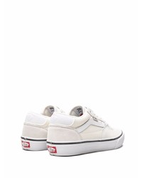 Baskets basses en toile beiges Vans