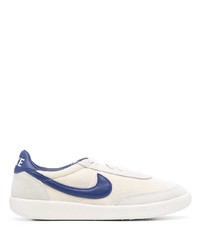 Baskets basses en toile blanc et bleu marine Nike