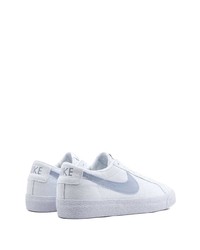 Baskets basses en toile blanc et bleu Nike