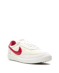 Baskets basses en toile blanc et rouge Nike