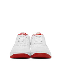 Baskets basses en toile blanc et rouge Nike