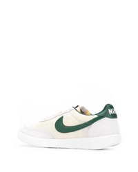 Baskets basses en toile blanc et vert Nike