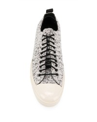 Baskets basses en toile blanches et noires Converse