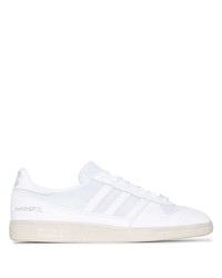 Baskets basses en toile blanches adidas