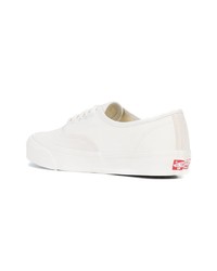 Baskets basses en toile blanches Vans