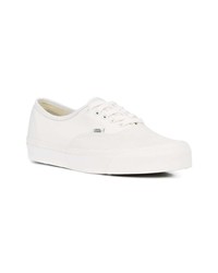 Baskets basses en toile blanches Vans