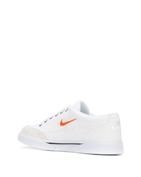 Baskets basses en toile blanches Nike